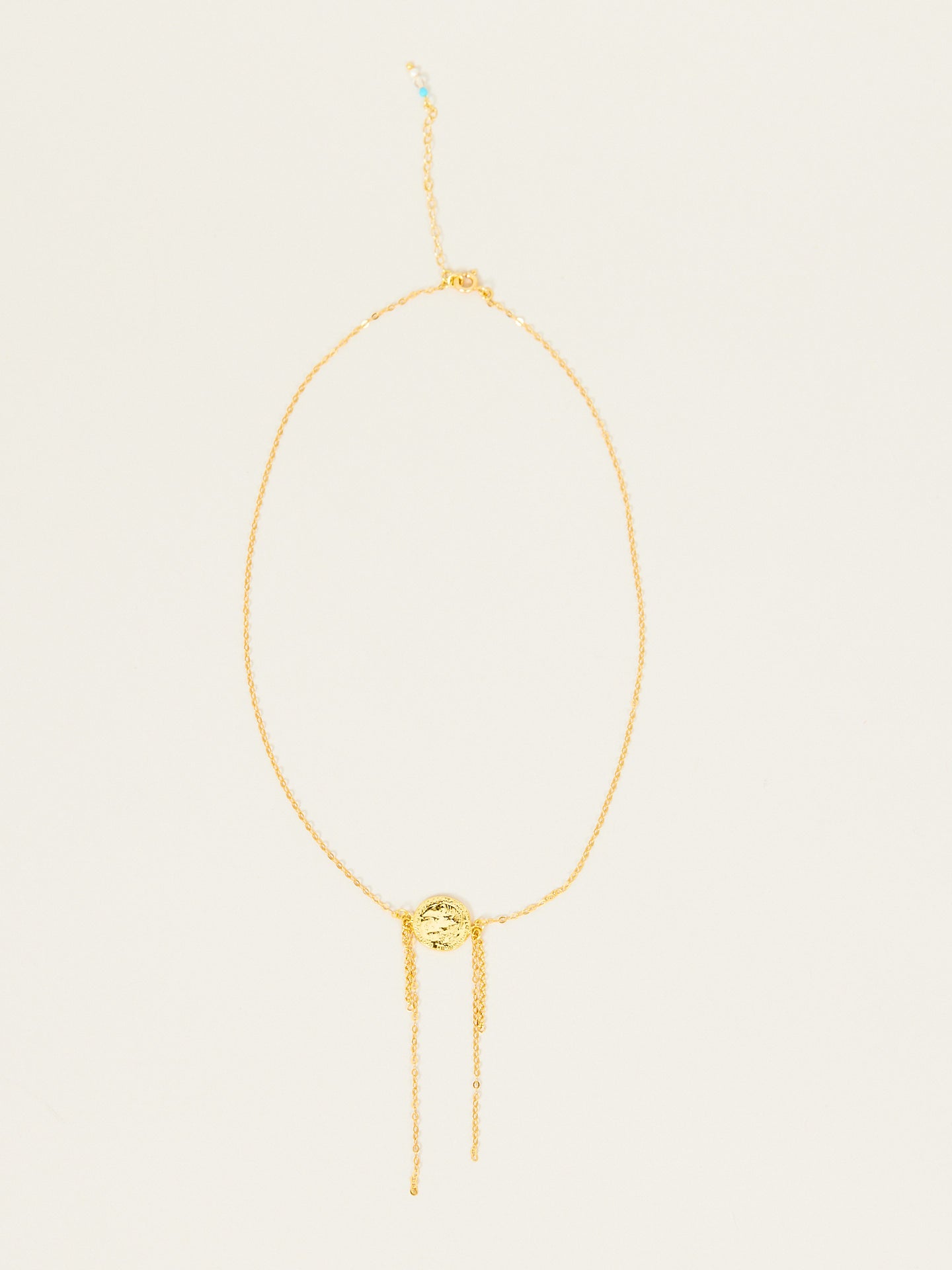 Goldene Halskette mit Anhängern (Münze)