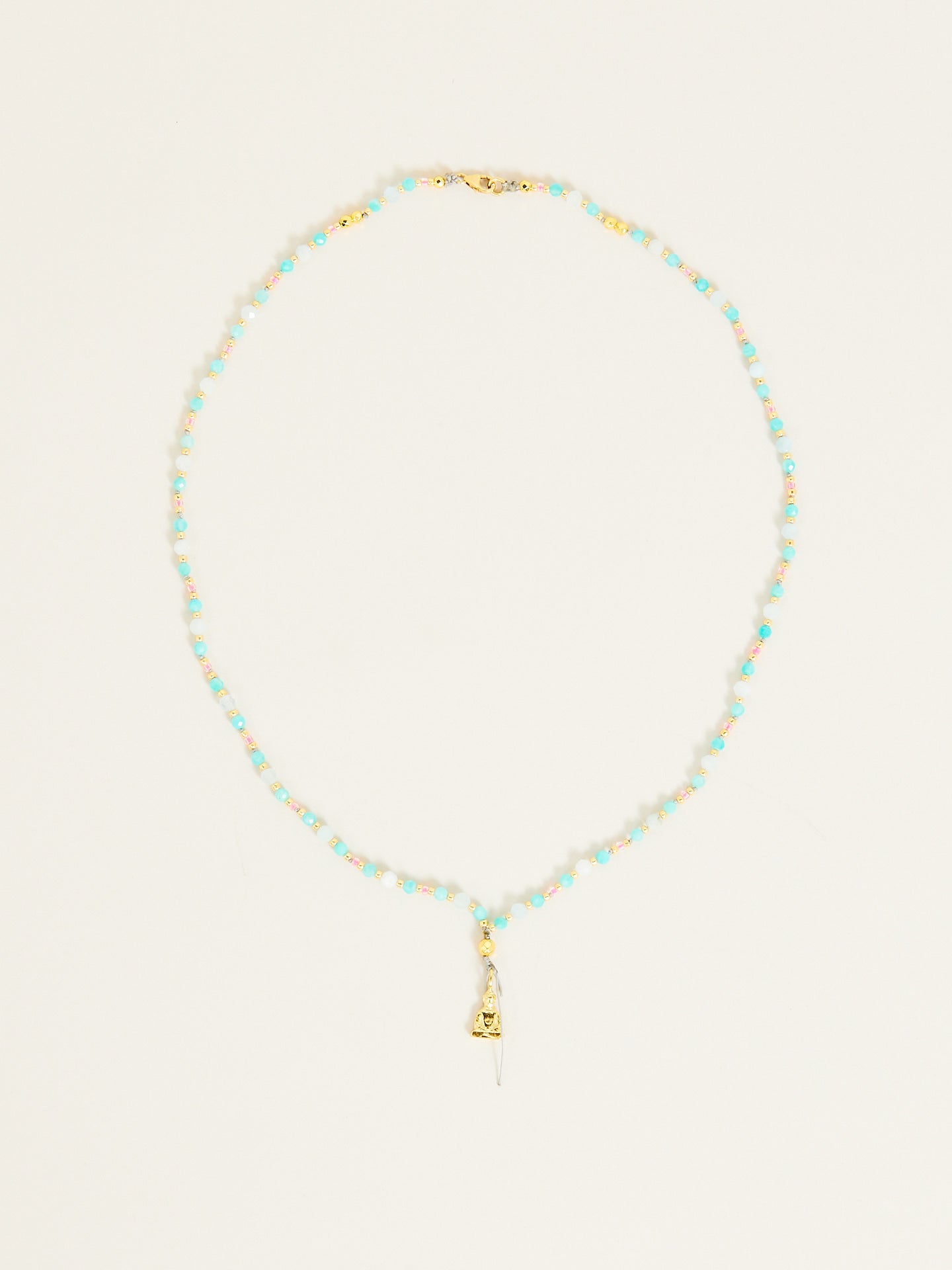 Zen Halskette mit buddha Anhänger und hellen Perlen in Pastelltönen